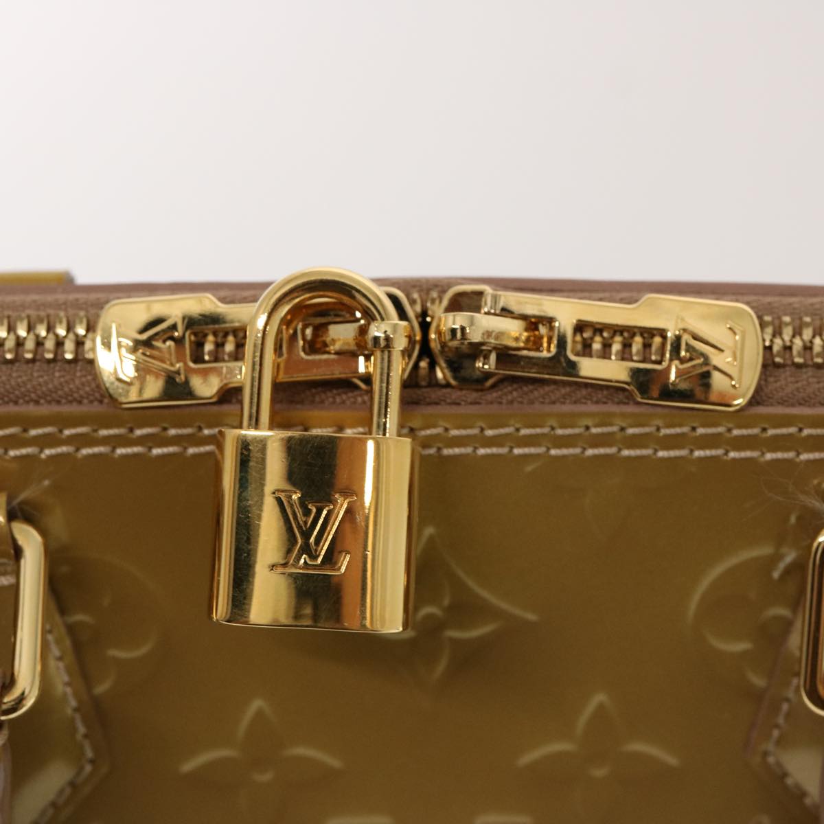 Louis Vuitton Alma PM Vernis Monogram Handbag